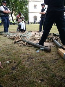 Police standing on tents